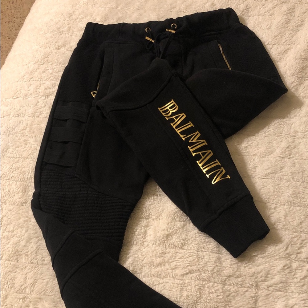 Balmain women Black Joggers with Gold Logo Script
Like New